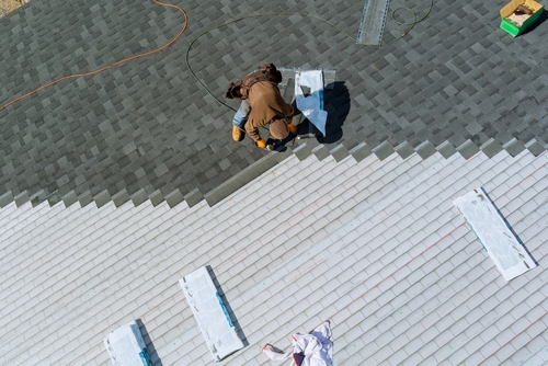 installing roof shingles